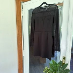 Black, slim fit cocktail dress, meche detail.